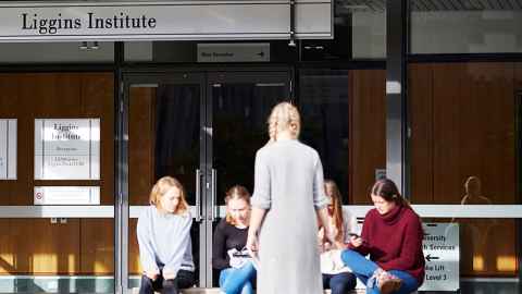 Students gathered outside the Liggins Institute building