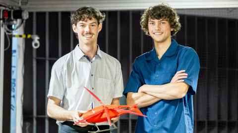 Samuel Gordon and Thomas Phillips with UAV in Wind Tunnel.