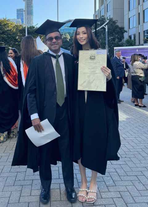 Associate Professor Gehan Gunasekara and masters graduate Tiffany Sze.