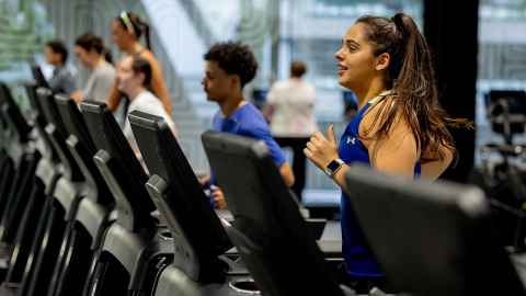 Students running on treadmills