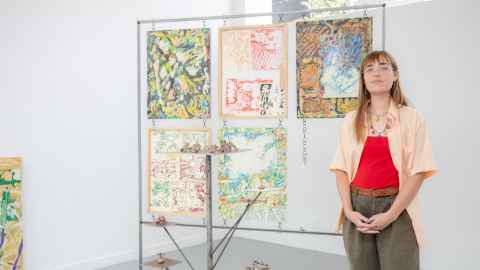 Georgia Arnold organising her exhibition ‘Dizziness & Drawing Breath’ for the Elam Artists Graduate Show.
