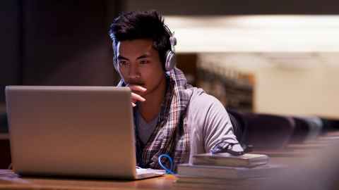 Person looking at laptop