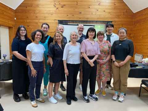 Some of PhD students with staff and visiting scholars