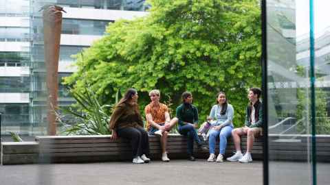 Students outdoors mingling