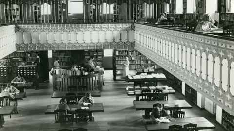 historical image of the University Library central lending desk