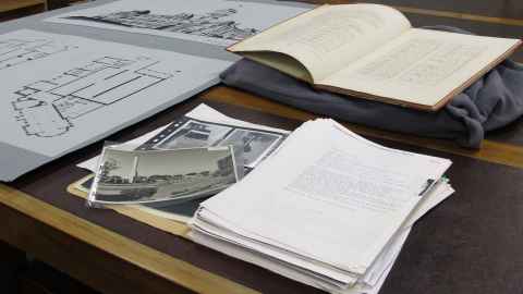 old photos and manuscripts being used for teaching in the reading room