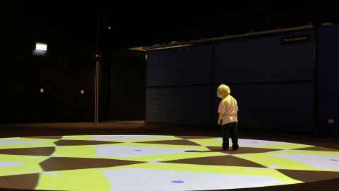 The pattern projection space, showing vibrant patterns on the ground. 