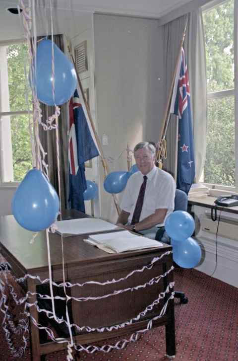 1992 Vice Chancellor Colin Maiden in his office with balloons to celebrate knighthood.