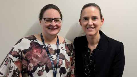 Dr Michelle Wilson (left) and Dr Nicky Lawrence against a blank wall.