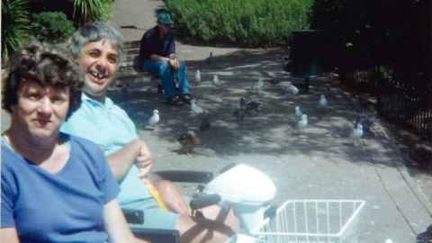 Out in a park on their mobility scooters, with seagulls