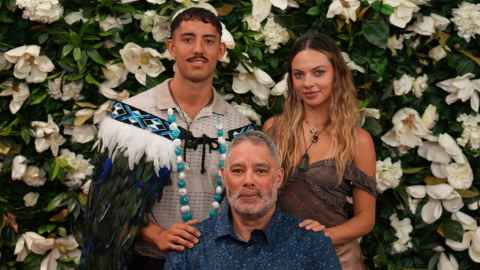 Joshua with his father, Mike Brown, and partner, Caitlyn Wheeler.