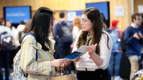 Science student and adviser discussing study options