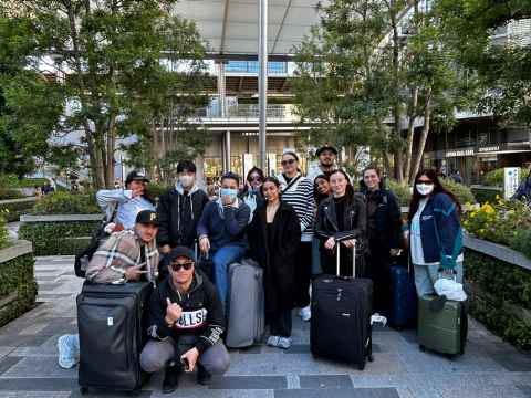 Group of students posing for picture in Japan