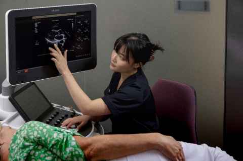 Woman having a cardiac ultrasound scan